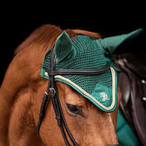 
                  
                    Green fly veil with gold cord trim, modelled on a chestnut horse.
                  
                